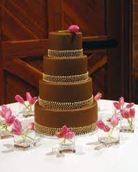 Chocolate Wedding Cake Maybe With Bigger Round Gold Confetti To Bring The Modern With The Glam Brown Wedding Cakes Wedding Desserts Chocolate Wedding Cake
