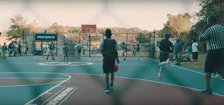 Trampoline courts, launch pad, basketball, besides an indoor mountain climbing wall. Nba 2k Publisher Launches Foundation Revamps Baltimore Basketball Court Technical Ly Baltimore