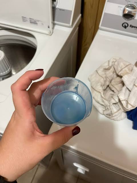 Clean deep detergent drawers with a washing up liquid bottle