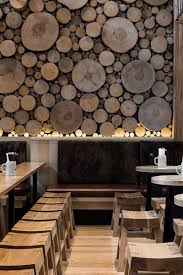 The Wall Of Logs In This Beerhall Is Meant Resemble A Forest Floor Interior Architecture Design Restaurant Interior Design Restaurant Interior