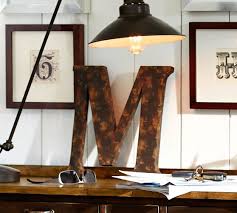 The wall letters can be initials or can form words that send messages. Rustic Metal Letters Wall Decor Pottery Barn