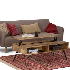 With a slim, metal base topped off with mango wood, our sculptural tulip pedestal dining table works great in spaces both small and large. Wyndenhall Moreno Solid Mango Wood And Metal Rectangle Industrial Contemporary Lift Top Coffee Table On Sale Overstock 18965709