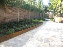 corten kantopsluiting steelgarden tuin design landschapsarchitectuur ontwerp tuin ideeen