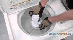 At the top of the agitator on most machines is a knurled knob. How To Whirlpool Kitchenaid Maytag Agitator Assembly Wp3951744 Youtube