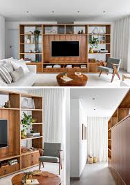 They enhance interior design with modern ideas and attractive decorating elements, like storage furniture. This Tv Is In The Ideal Position By Cleverly Using A Large Room Divider As A Wall