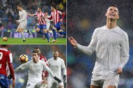 Carlos carmona (sporting gijon) marque du pied droit. Cristiano Ronaldo S Recycled Real Madrid Strip Turns See Through As Rain Pours During Win Over Sporting Gijon Mirror Online