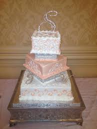 Here are great examples showing how cool they are. Glamorous Square 3 Tier Wedding Cake With Rhinestone Risers Wedding Cake Stands Wedding Cake Roses Bling Wedding Cakes