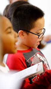 4th graders sing holiday classics to Quincy elders