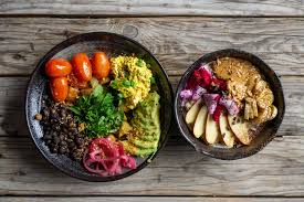 While the loss of vision is often associated with getting older, according to the national eye institute, approximately 11 million americans age 12 or older could impr. Top View Food Photo Of Healthy Breakfast Porridge With Fresh Fruits And Peanut Butter And A Healthy Vegan Lunch With Black Beans Avocado Baked Potatoes And Cherry Tomatoes On A Wooden Table