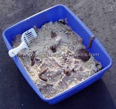 Decorate the cake with the green cookie crumbles and tootsie rolls. Coolest Kitty Litter Cake Photos