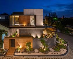In itself, a corner lot makes little difference. A Zen Garden Wraps Around The Corner Of This House
