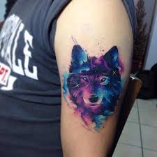 Galactic Wolf Tattoo On The Left Upper Arm Tattoo Little Tattoos For Men And Women Wolf Tattoos Men Tattoos Watercolor Wolf Tattoo
