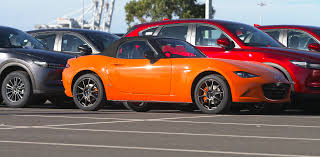 Image result for Hailey Orange 1965 Mazda