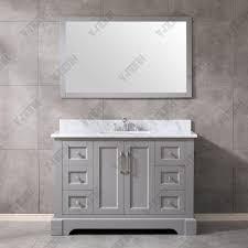 The walnut cabinet base helps the airy color palette feel grounded. China 48inch Charcoal Grey Single Sink Free Standing Best Selling Bathroom Vanity China Transitional Wall Mounted