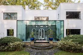A glass box peeps over a brick wall at this victorian property in east london , introducing natural light into the new living space created by local architecture practice studio 304. Glass Box Extension Modernist House Via The Modern House Mad About The House