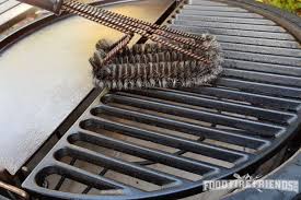 Close Up Of Grill Brush Cleaning Cast Iron Grill Grates Cast Iron Cleaning Cast Iron Grill Grill Grates