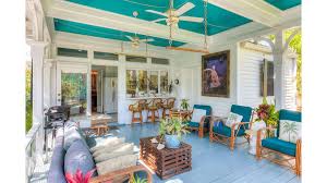 This Historic And Impossibly Colorful Key West Mansion Is Being Sold For The Second Time In 153 Years Key West Interior Design Key West Living Room Beach House Interior