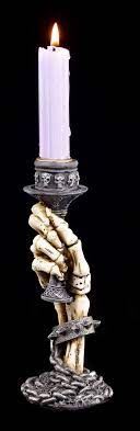 Besides creating innovative candles, this company also makes their own candle holder. Skeleton Hand Candle Holder From The Crypt Miscellaneous Candleholder Home Furnishings Gothic Shop Www Figuren Shop De