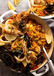 Looking for something different, fun, festive, exciting and delicious? Spanish Paella Recipetin Eats