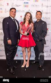 Cenk Uygur, left, Ana Kasparian, and Steve Oh pose with the 2016 Vision  award for The Young Turks at the 31st Annual Imagen Awards ceremony on  Friday, Sept. 9, 2016, in Beverly