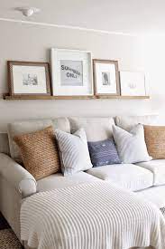 Sofa table with shelves are essential pieces in the living room and the design of the family room. Parbaude Mutiski Iznicinoss Shelf Above Sofa Ipoor Org