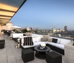 Roof Top Cafe With Open Space And A Beautiful View The Stone Tile Flooring And The Walls Stimulate A Nature Effec London Rooftop Bar London Bars London Hotels