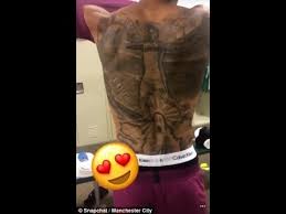 The german got a massive back tattoo in 2017, a tattoo he now regrets getting. Man City S Leroy Sane Shows Off Back Tattoo Of Himself Youtube