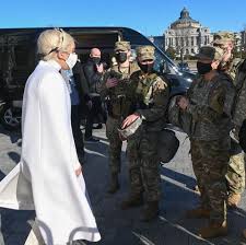 Dal discorso di uncle joe agli 'hunger games' di lady gaga: Twitter Reacts To Lady Gaga S Dress Worn At The 2021 Inauguration Of Joe Biden And Kamala Harris