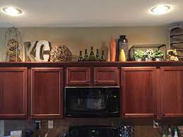 Above Kitchen Cabinets Decor Kitchen Cabinets Decor Cabinet Decor Farmhouse Kitchen Decor