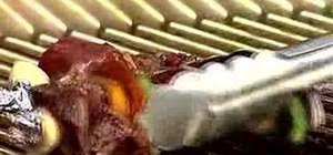 Directions for cooking a rotisserie chicken on a gas grill with rotisserie attachment. How To Use The Rotisserie On A Lynx Grill Kitchen Utensils Equipment Wonderhowto