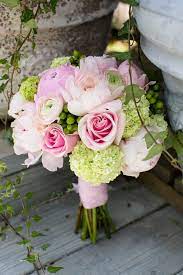 This flower is perfect for fleshing out a classic wedding bouquet or arrangement. 19 Pink And Green Flower Arrangements Ideas Flower Arrangements Flowers Arrangement