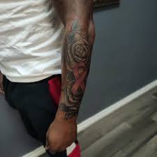 The popular cancer ribbon is probably the popular cancer ribbon is probably breast ribbon, the pink one. Breast Cancer Ribbon And Roses Tattoo Time Tattoo Studio Facebook