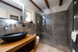 Use spacers to hold tiles in place while they dry. Sleeping Area Casa Famiglia Brenner