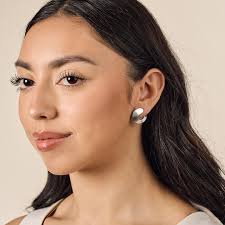 Originally released in 1984, the Hoopla Hoop Earrings are now available  again for a limited time. Featuring graceful and elegant details that are  commonly seen from Mr. Avery's designs, these earrings add