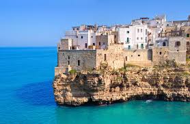 It is a port on the adriatic sea, northwest of brindisi. Bari