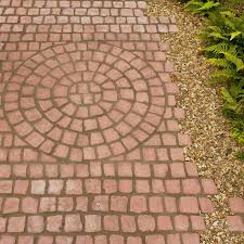 Every slab of this natural sandstone paving by bradstone's stoneflair range is unique and every stone tells a story. Rustic Red Carpet Stones Cobble Mat Straight L 1200mm W 400mm Departments Diy At B Q Red Brick Paving Paving Stones Concrete Blocks Diy