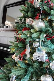 ;) this year for our christmas mantel, i wanted to go white and silver with a touch of aqua. Decorating The Christmas Tree At Our House Satori Design For Living