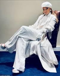 Everything about this is so extra. Jennifer Lopez Wears White Trouser Suit For Joe Biden S Inauguration Daily Mail Online