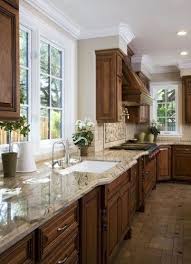 Modern kitchen with dark stain shaker cabinets. Like Cabinets And Countertop Kitchen Remodel Kitchen Renovation Brown Kitchen Cabinets