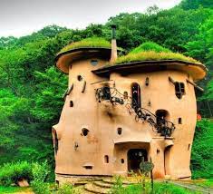 10 Gorgeous Green Homes That Will Make You Want To Go Off The Grid And Live In A Forest Cob Building Unique Houses Cob House