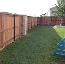 They will grow through between branches and create a living house border to lessen the fragile vibe created by the fence. What S The Best Type Of Wooden Fence For You Northwest Fence Iron