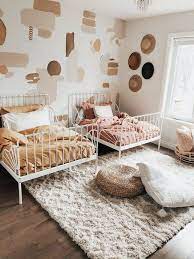 9 Boho Girls Room Ideas That Any Young Lady Would Be Happy To Call Their Own Shared Girls Room Kid Room Decor Girl Room