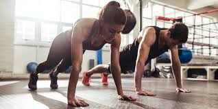 Decline push up exercise guide with instructions, demonstration, calories burned and muscles worked. How Many Pushups Should You Do Per Day Openfit