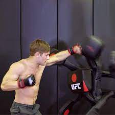 Ufc Bas Body Action System Deluxe Professional Freestanding Home Training Equipment System For Mma Kickboxing Muay Thai And Martial Arts Adjustable Punching And Kicking Pads Sports Outdoors Amazon Com