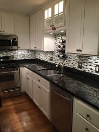 Shop with afterpay on eligible items. White Cabinets Black Counter Tops Stephen S Favorite So Far Off White Kitchens Black Granite Kitchen Kitchen Design