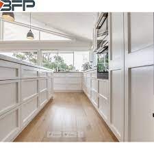 If you're not ready for a full remodel or if painting your cabinets isn't an option, then you'll love my ideas for working with what you have to create a modern kitchen with oak cabinets. China Australia Modern White Lacquer 2 Pac Kitchen Cabinets Home Furniture Without Handles China Kitchen Cabinets Bedroom Furniture