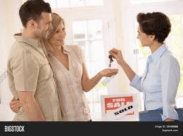 Handing over the keys gives the agent the permission to access the property at will without asking for your permission. Estate Agent Handing Image Photo Free Trial Bigstock