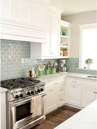 For a kitchen that is contemporary, choose a linear glass tile in a color that pops off the cabinets and countertops. Botb 4 1 12 Centsational Girl Kitchen Remodel Kitchen Inspirations New Kitchen