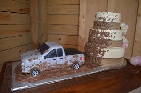 Groom S Cake Truck Throwing Mud Onto The Wedding Cake Mudding Wedding Cakes Wedding Cake Guide Funny Wedding Cakes