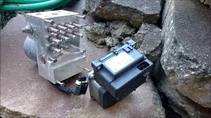 In order to unlock the doors to release the hood latch, one must raise the vehicle and connect a battery charger or jumper cable to the starter + terminal . Open A Vt Vx Vy Vz Holden Commodore Bonnet When The Cable Is Snapped By Toms Car Hold